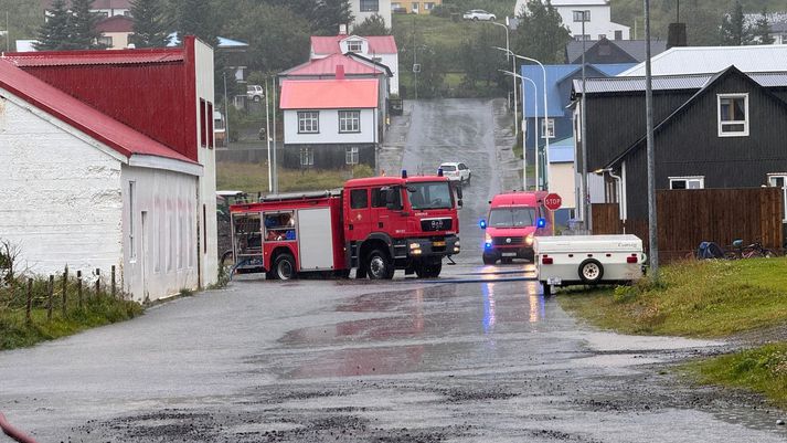 Slökkvilið er við störf á Siglufirði.