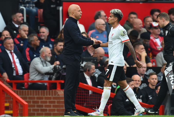 Arne Slot og Luis Díaz nutu sín vel á Old Trafford.