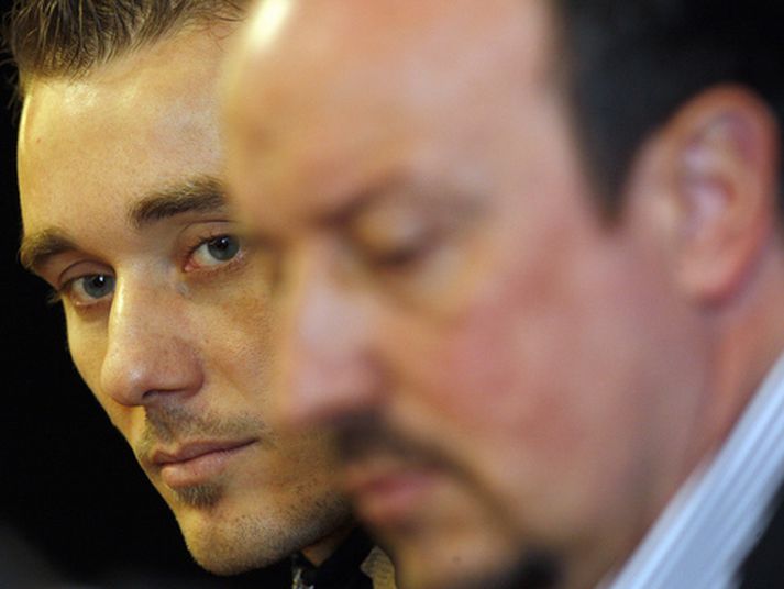 Fabio Aurelio og Rafael Benitez, stjóri Liverpool.