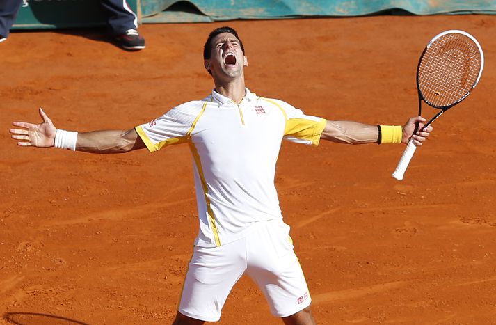 Nadal fagnar sigrinum á leirnum í Monte Carlo í dag.