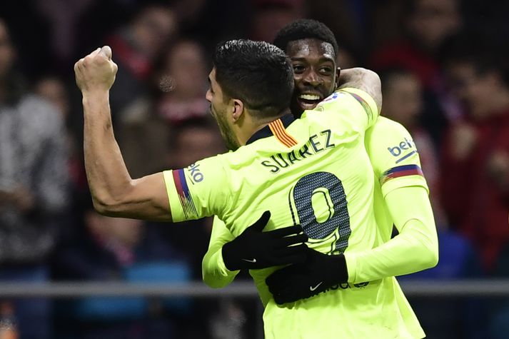 Dembele og Suarez fagna jöfnunarmarkinu.