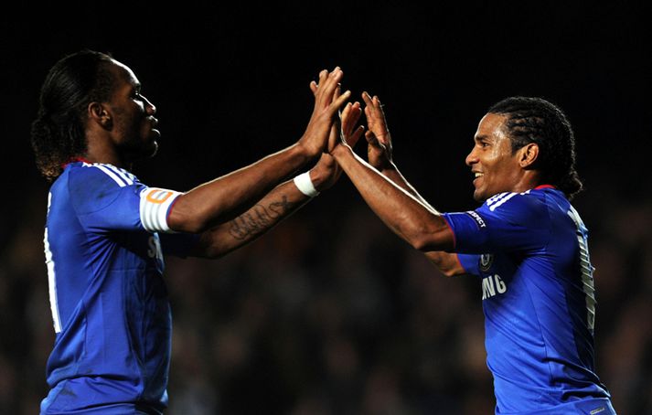 Drogba og Malouda fagna sigurmarki leiksins í kvöld. Nordic Photos/AFP