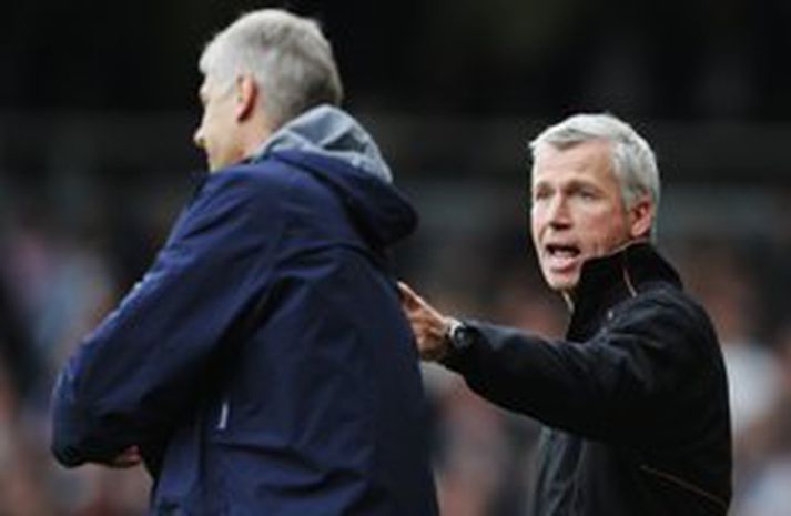 Wenger og Pardew hnakkrifust um helgina og rifu hvor í annan