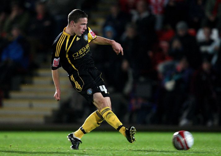 John Rooney lék áður með Macclesfield á árunum 2008-10.