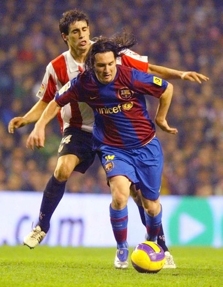 Lionel Messi og Markel Susaeta berjast um knöttinn leik Athletic Bilbao og Barcelona í dag.