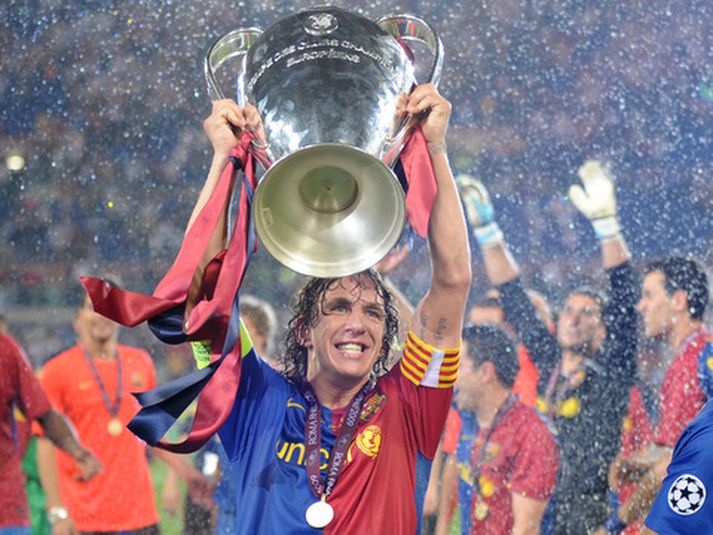 Carles Puyol hefur lyft Meistaradeildarbikarnum tvisvar sinnum á síðustu þremur árum.