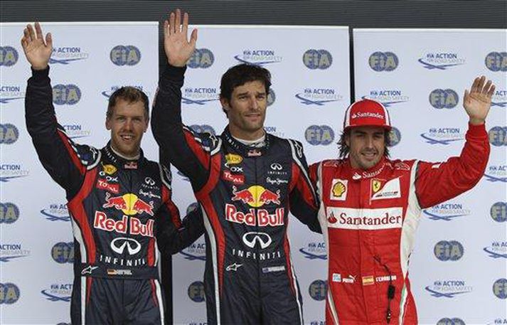 Sebastian Vetttel, Mark Webber og Fernando Alonso eftir tímatökuna á Silverstone í dag.