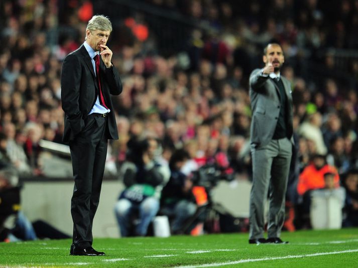 Arsene Wenger og Pep Guardiola á hliðarlínunni í fyrra.