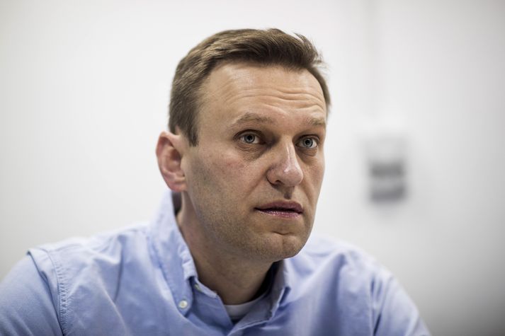 Alexei Navalny var handtekinn fyrir utan heimili sitt í Moskvu í dag.