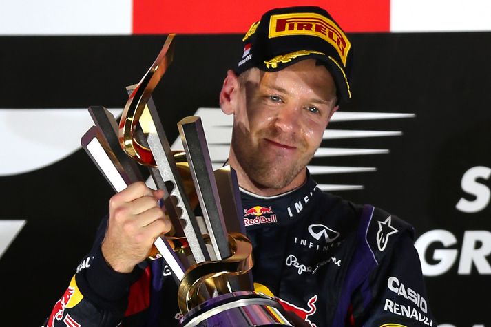 Sebastian Vettel fagnar hér sigrinum.