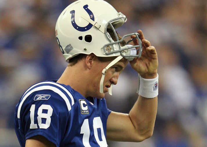 Peyton Manning og félagar í Indianapolis Colts duttu óvænt úr leik í úrslitakeppni NFL-deildarinnar í kvöld.