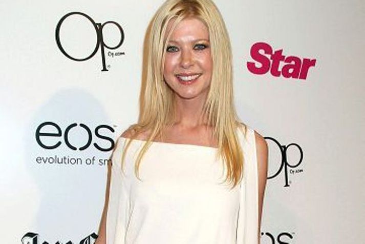 Skilin Tara Reid er skilin eftir aðeins tveggja mánaða hjónaband. 
nordicphotos/getty