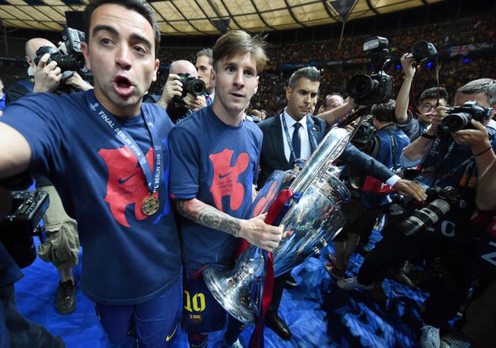 Xavi og Lionel Messi unnu marga titla saman hjá Barcelona.