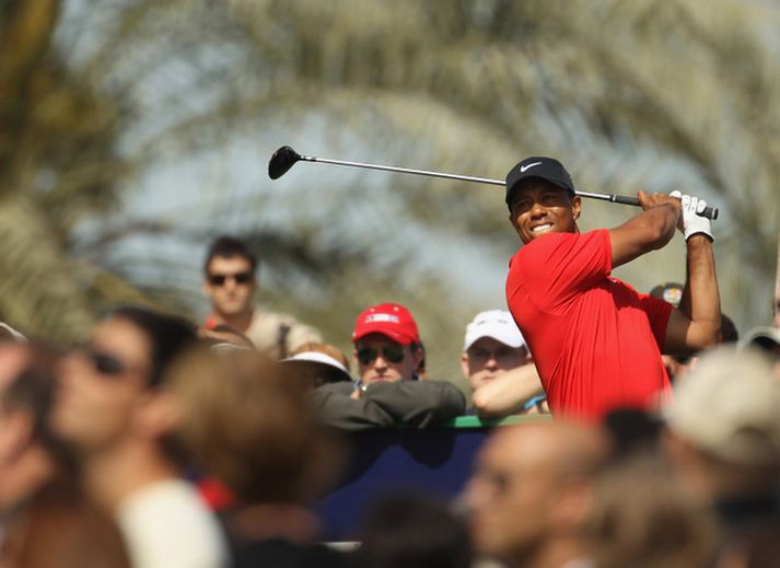 Tiger Woods verður í ráshóp með Phil Mickelson og Graeme McDowell fyrstu tvo keppnisdagana á heimsmótinu í Miami.