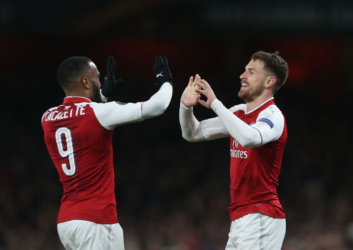 Lacazette og Ramsey í leik með Arsenal á síðasta ári