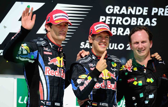 Mark Webber, Sebastian Vettel og Christian Horner fögnuðu titli bílasmiða og sigri í Brasilíu í dag.