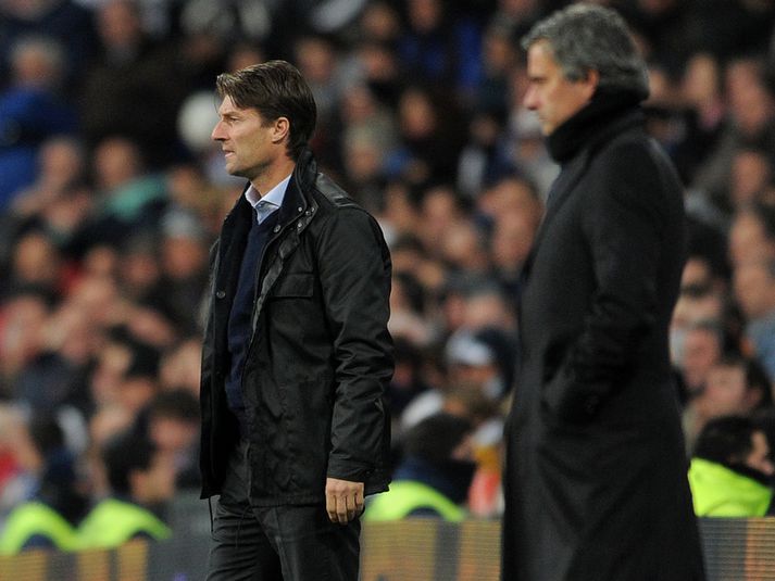 Michael Laudrup stýrir hér liði sínu á móti Jose Mourinho.