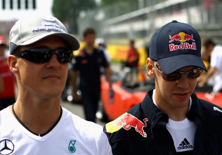 Þjóðverjarnir Michael Schumacher og Sebastian Vettel hafa þekkst lengi og Schumacher spáði Vettel frama þegar hann var ungur að árum í kart kappakstri.