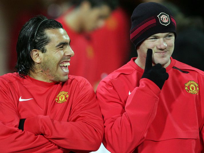 Carlos Tevez og Wayne Rooney.