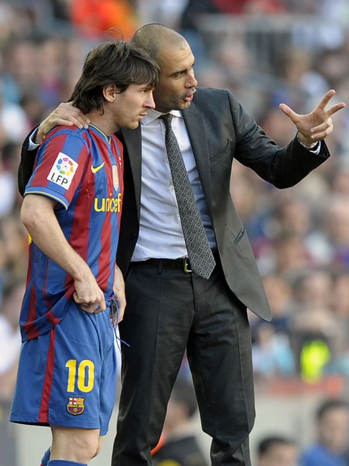 Pep Guardiola og Lionel Messi.