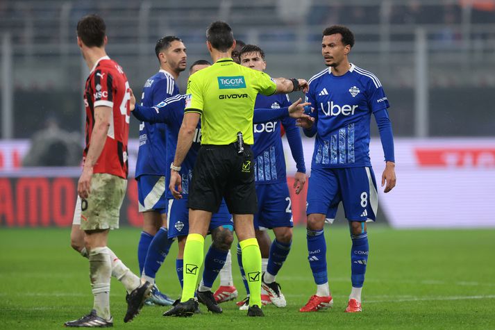 Matteo Marchetti dómari leiksins sendi Dele Alli snemma í sturtu í leiknum á móti AC Milan í gær.