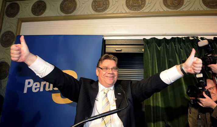 Timo Soini Leiðtogi Sannra Finna var að vonum glaður þegar úrslit kosninganna lágu fyrir. Nordicphotos/Afp