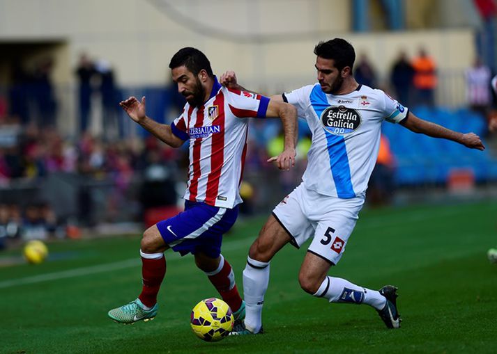 Arda Turan í baráttunni á Vicente Calderon í dag.