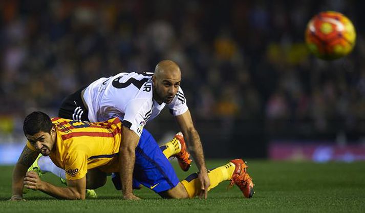 Suárez og Abdennour eigast við.