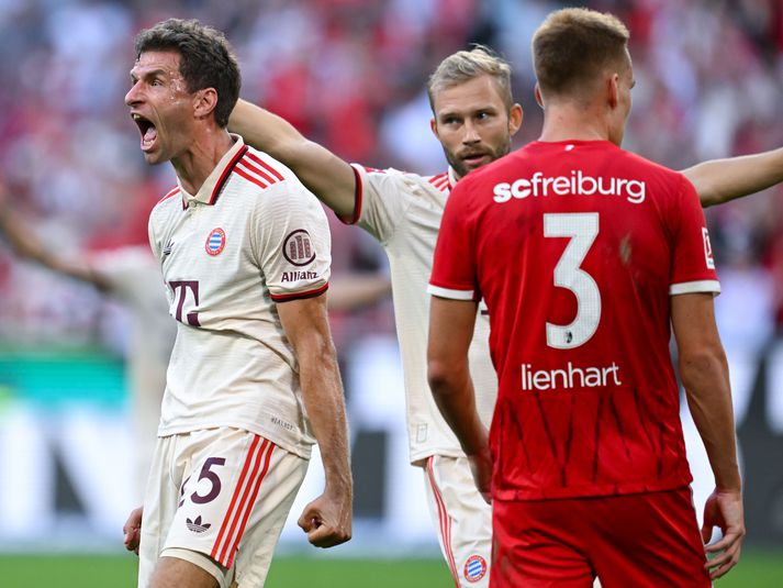 Thomas Muller sáttur með markið sem innsiglaði sigur Bayern Munchen í dag.