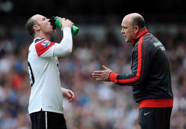 Wayne Rooney og Mike Phelan þekkjast vel frá tíma þeirra saman í Manchester.