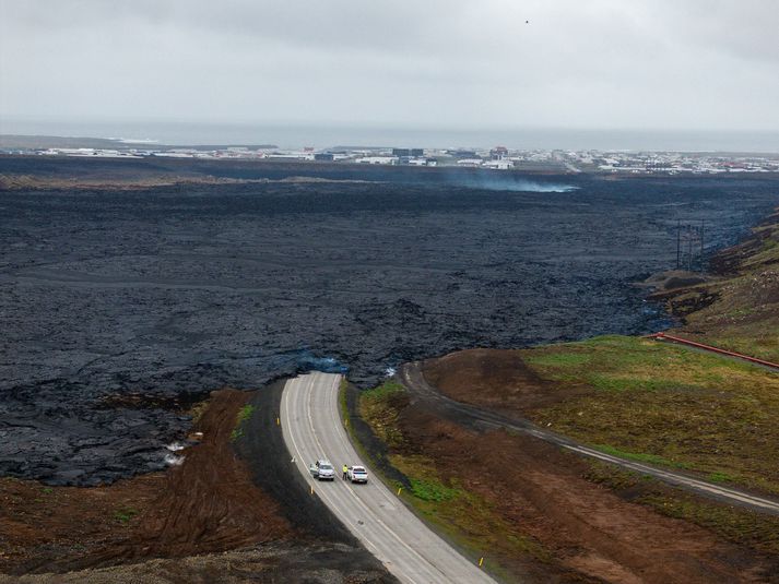 Hraunið rann yfir Grindavíkurveg í gær.