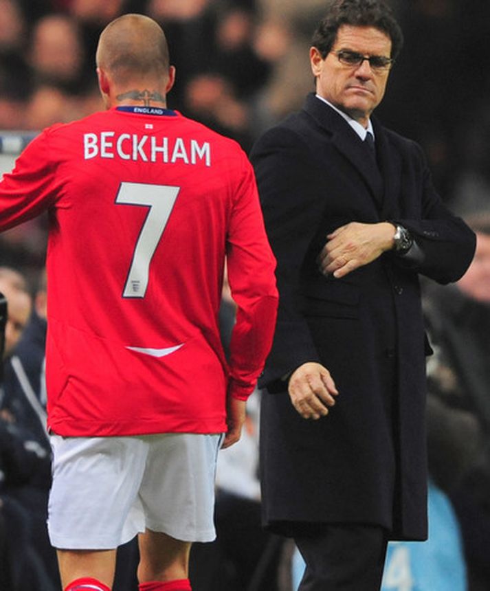 David Beckham og Fabio Capello í leik með enska landsliðinu.