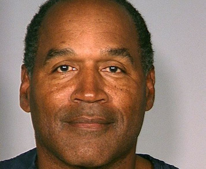 O.J. Simpson á lögreglustöð í Las Vegas eftir handtökuna í gær.