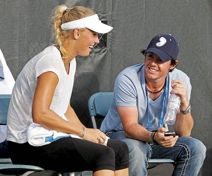 Caroline Wozniacki og Rory McIlroy ræða hér málin á æfingavelli í Cincinnati í Bandaríkjunum.