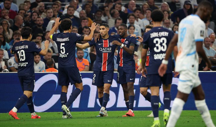 Olympique de Marseille v Paris Saint-Germain - Ligue 1 McDonald's MARSEILLE, FRANCE - OCTOBER 27: Hachraf Hakimi #2 and Ousmane Dembele #10 of Paris Saint-Germain celebrate the second goal during the Ligue 1 McDonald's match between Olympique de Marseille and Paris Saint-Germain at Orange Velodrome on October 27, 2024 in Marseille, France. (Photo by Xavier Laine/Getty Images)