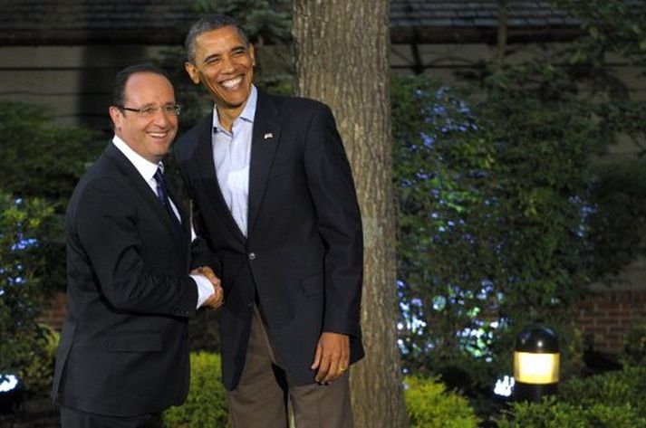 Barack Obama, forseti Bandaríkjanna, heilsar hér Francois Hollande, forseta Frakklands.