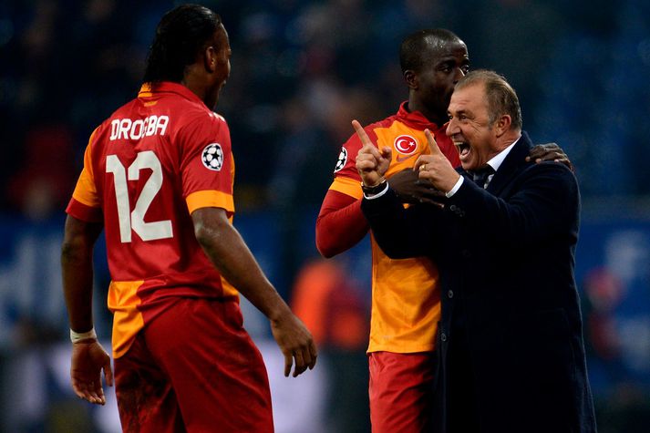 Fatih Terim og Didier Drogba fagna í kvöld.