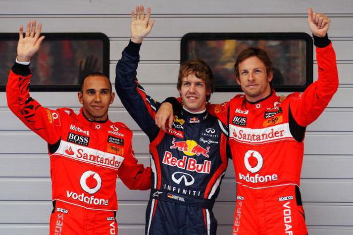 Lewis Hamilton, Sebastian Vettel og Jenson Button börðust um besta tíma við keppnauta sína í tímatökum í Sjanghæ í morgun.