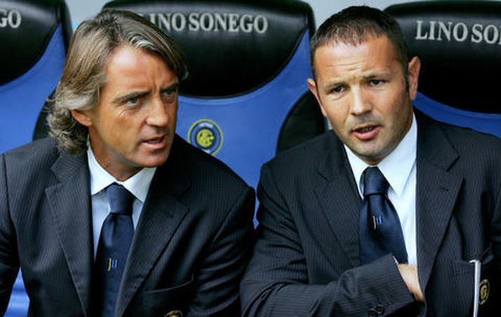 Mihajlovic, til hægri, með Roberto Mancini.