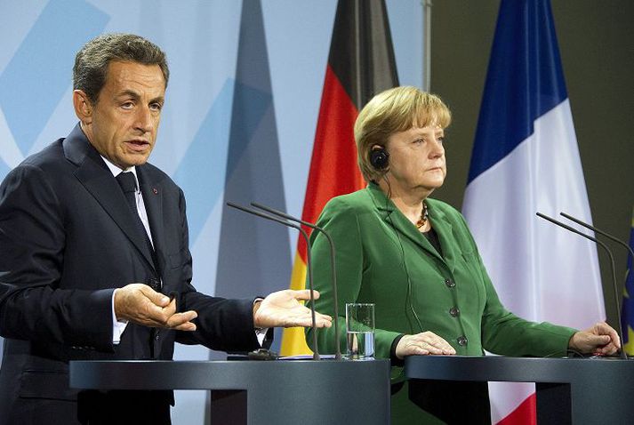 Sarkozy og Merkel segja að nánar verði gert grein fyrir samkomulagi um endurfjármögnun bankakerfis evrusvæðisins í lok mánaðarins.nordicphotos/afp