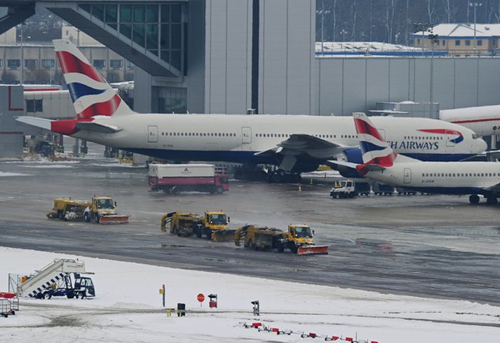 British Airways vél á Heathrow flugvelli. Mynd/ AFP.