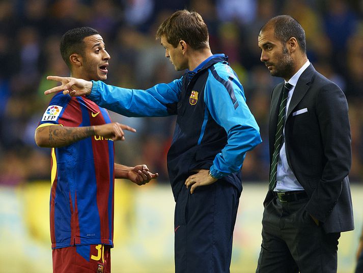 Thiago og Pep Guardiola.