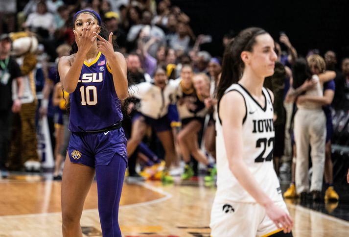 NCAA Women's Basketball Tournament - National Championship DALLAS, TEXAS - APRIL 02: Angel Reese #10 of the LSU Lady Tigers reacts in front of Caitlin Clark #22 of the Iowa Hawkeyes towards the end of the 2023 NCAA Women's Basketball Tournament championship game at American Airlines Center on April 02, 2023 in Dallas, Texas. (Photo by Ben Solomon/NCAA Photos via Getty Images)