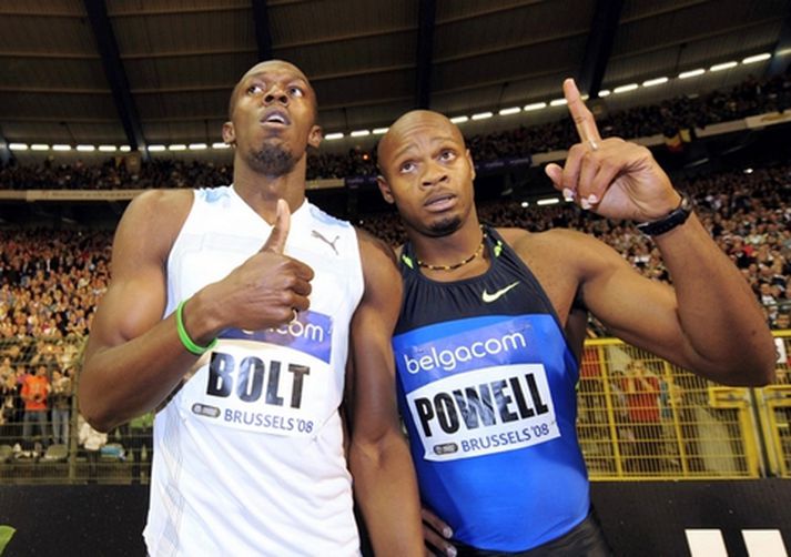 Usain Bolt og Asafa Powell eftir sprettinn í kvöld.